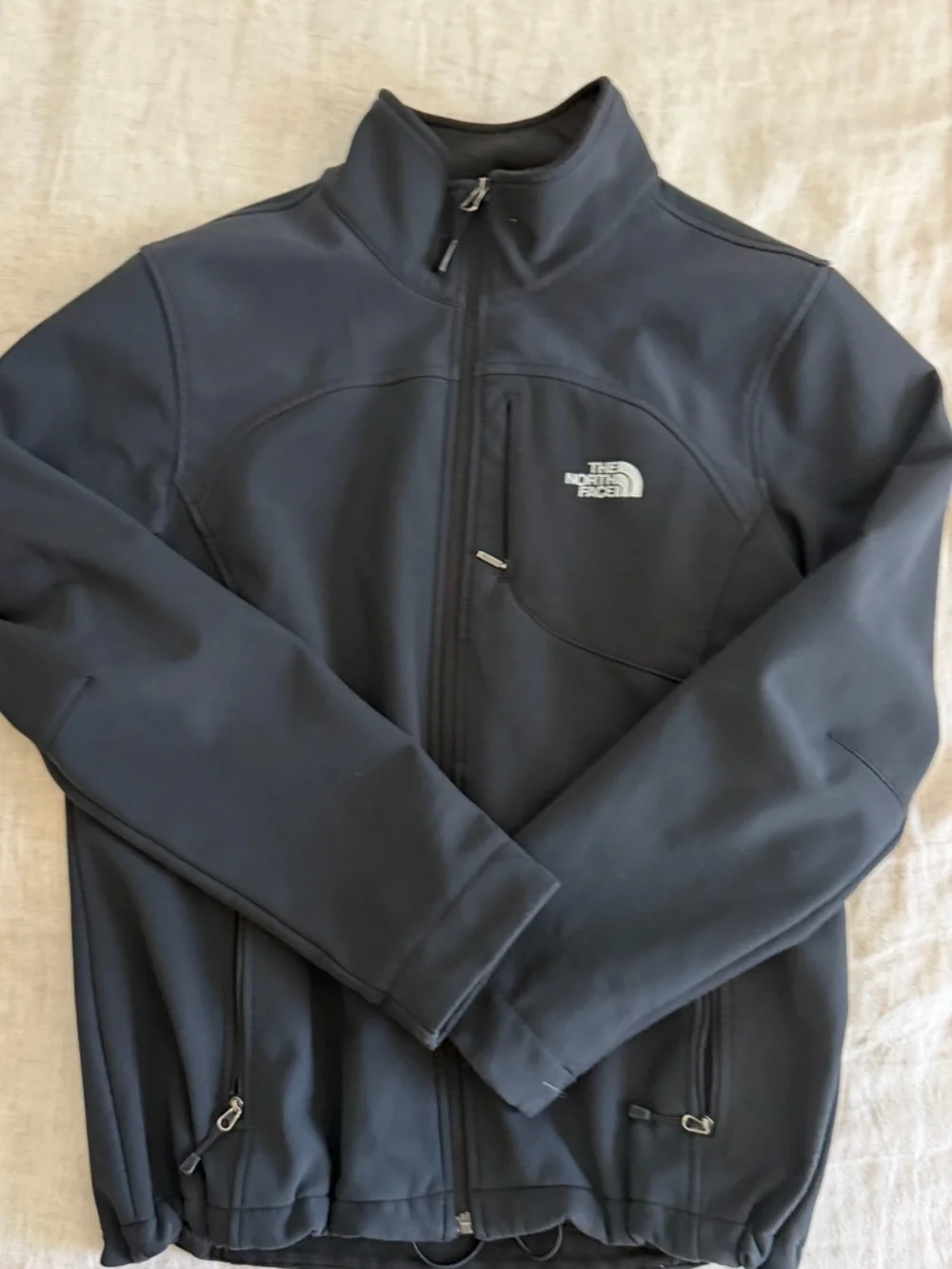 The North Face Men’s Dark Gray Softshell Jacket with High Collar